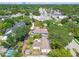 A high-angle view of the property, showing its proximity to local businesses and adjacent homes at 4417 W El Prado Blvd, Tampa, FL 33629