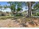 Cozy single-story residence with mature trees, charming shutters, and a neatly kept lawn at 4417 W El Prado Blvd, Tampa, FL 33629