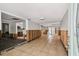 Spacious living room area with tile flooring, with open concept access to the kitchen at 4417 W El Prado Blvd, Tampa, FL 33629
