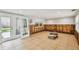 Large room with tile floors and natural light through doors, ready for customization at 4417 W El Prado Blvd, Tampa, FL 33629