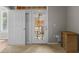 Bedroom with a french door to the balcony and neutral carpet and walls at 5000 Culbreath Key Way # 1-112, Tampa, FL 33611