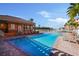 Community pool offers residents a refreshing retreat with ample seating and lush landscaping at 5000 Culbreath Key Way # 1-112, Tampa, FL 33611
