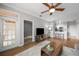 Cozy open-plan living room featuring modern decor, and great access to kitchen at 5000 Culbreath Key Way # 1-112, Tampa, FL 33611