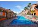 Resort-style community pool overlooking the marina with lounge chairs and tropical landscaping at 5000 Culbreath Key Way # 1-112, Tampa, FL 33611