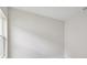 Empty bedroom with white walls, neutral carpet, and a single window at 5178 Everlong Dr, Apollo Beach, FL 33572