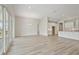 Open-concept living room with access to the patio featuring recessed lighting and modern floors at 5178 Everlong Dr, Apollo Beach, FL 33572