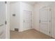 Unfinished basement with painted block walls and concrete flooring, showing utility access at 5521 Yellowfin Ct, New Port Richey, FL 34652