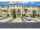 Beautiful townhouses each boast a private garage, private balcony, and tidy landscaping at 5521 Yellowfin Ct, New Port Richey, FL 34652
