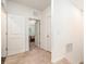 Hallway with doors leading to various rooms in the house at 5521 Yellowfin Ct, New Port Richey, FL 34652