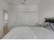 Bright bedroom with a large bed, closet and views to the landing on the second floor at 5611 Del Coronado Dr, Apollo Beach, FL 33572