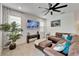Comfortable living room featuring a large sectional sofa and stylish decor at 5611 Del Coronado Dr, Apollo Beach, FL 33572