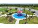 Community playground features a climbing structure, benches, and landscaping at 5611 Del Coronado Dr, Apollo Beach, FL 33572