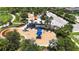 Community playground with slides, benches, picnic area, and landscaping at 5611 Del Coronado Dr, Apollo Beach, FL 33572