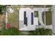 Birds eye view of house showing solar panels, patio and shed in the backyard at 5895 16Th N St, St Petersburg, FL 33703