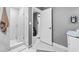 This bathroom features a frameless glass shower, complemented by a stylish vanity at 5895 16Th N St, St Petersburg, FL 33703