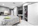 This bedroom features a spacious closet and a well-lit vanity area, offering ample storage at 5895 16Th N St, St Petersburg, FL 33703
