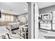 Bright bedroom featuring a sleek adjacent bathroom design, complemented by stylish fixtures and finishes at 5895 16Th N St, St Petersburg, FL 33703