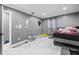 Spacious bedroom with lots of natural light, complemented by bright flooring at 5895 16Th N St, St Petersburg, FL 33703