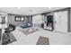 Open-concept space with sleek tile flooring, lots of light, and gray decor at 5895 16Th N St, St Petersburg, FL 33703