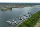 Aerial view of waterfront neighborhood featuring marina, canal access, and nearby residential area at 6107 Marbella Blvd, Apollo Beach, FL 33572
