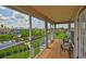 This balcony overlooks the canal and tropical foliage at 6107 Marbella Blvd, Apollo Beach, FL 33572