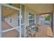 This screened-in balcony features outdoor seating at 6107 Marbella Blvd, Apollo Beach, FL 33572