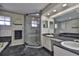 This bathroom features granite countertops and a glass shower at 6107 Marbella Blvd, Apollo Beach, FL 33572