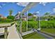 Includes a private boat lift and dock, ideal for enjoying waterfront activities and scenic views of the neighborhood at 6107 Marbella Blvd, Apollo Beach, FL 33572