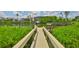 Inviting waterfront living with a private dock and lush greenery in a peaceful residential neighborhood at 6107 Marbella Blvd, Apollo Beach, FL 33572
