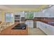 Open kitchen featuring granite countertops, stainless appliances, and ample storage, ideal for cooking and entertaining at 6107 Marbella Blvd, Apollo Beach, FL 33572