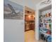 Open kitchen view including modern appliances and walk-in pantry at 6161 Gulf Winds Dr # 347, St Pete Beach, FL 33706