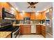 Well-equipped kitchen features stainless steel appliances and granite countertops at 6161 Gulf Winds Dr # 347, St Pete Beach, FL 33706