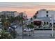 Balcony view featuring nearby beachfront businesses, including a Hilton Garden Inn at 6161 Gulf Winds Dr # 347, St Pete Beach, FL 33706