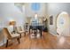 Elegant living room with soaring ceilings, large windows, and stylish decor at 6186 Seaside Dr, New Port Richey, FL 34652