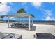 Beachside picnic spot with covered tables and stunning views of the ocean at 6186 Seaside Dr, New Port Richey, FL 34652