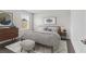 Stylishly decorated bedroom featuring neutral walls, carpet, and coordinated furniture at 6248 Bradford Woods Dr, Zephyrhills, FL 33542