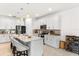 Modern kitchen with stainless steel appliances, spacious island, and ample cabinet space at 6248 Bradford Woods Dr, Zephyrhills, FL 33542