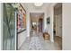 Inviting foyer with tiled floors, neutral paint, and views of the home's open-concept layout at 6467 Seasound Dr, Apollo Beach, FL 33572