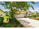 Charming single-Gathering home with a lush lawn and mature landscaping at 6467 Seasound Dr, Apollo Beach, FL 33572