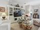 Comfortable living room featuring stylish decor, custom cabinets, and ample seating at 6467 Seasound Dr, Apollo Beach, FL 33572