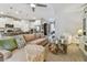 Bright, open living space flowing into the kitchen and dining area, with comfortable seating at 6467 Seasound Dr, Apollo Beach, FL 33572