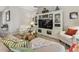 Inviting living room with custom built-ins, comfortable seating, and stylish decor at 6467 Seasound Dr, Apollo Beach, FL 33572