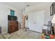 Office space featuring a TV, hardwood furniture, and adjacent double door closet at 6467 Seasound Dr, Apollo Beach, FL 33572