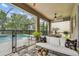Relaxing screened patio with comfortable seating overlooking a sparkling pool and yard at 6467 Seasound Dr, Apollo Beach, FL 33572
