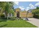 Attractive home with a three-car garage, lush lawn, and a basketball hoop, offering ample space and curb appeal at 6706 Riverside Bluffs Dr, Riverview, FL 33578