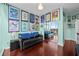 Comfortable bedroom decorated with hardwood floors and a large mirror reflecting the beautiful city view at 777 N Ashley Dr # 1903, Tampa, FL 33602