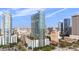 Luxury high-rise condo building in an urban city setting with blue skies and city views at 777 N Ashley Dr # 1903, Tampa, FL 33602