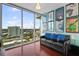 Inviting living room with hardwood floors, city views and comfortable seating at 777 N Ashley Dr # 1903, Tampa, FL 33602