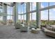 Modern lobby featuring comfortable seating, floor to ceiling windows and great city views at 777 N Ashley Dr # 1903, Tampa, FL 33602
