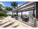 Outdoor patio featuring comfortable seating and palm trees at 777 N Ashley Dr # 1903, Tampa, FL 33602